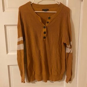 American eagle burnt orange sweater! NWOT size medium with buttons and stripes